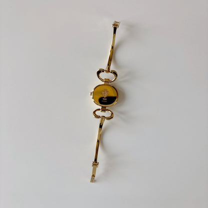 Gucci 1990s Oval Dial Gold Plated Bangle Watch