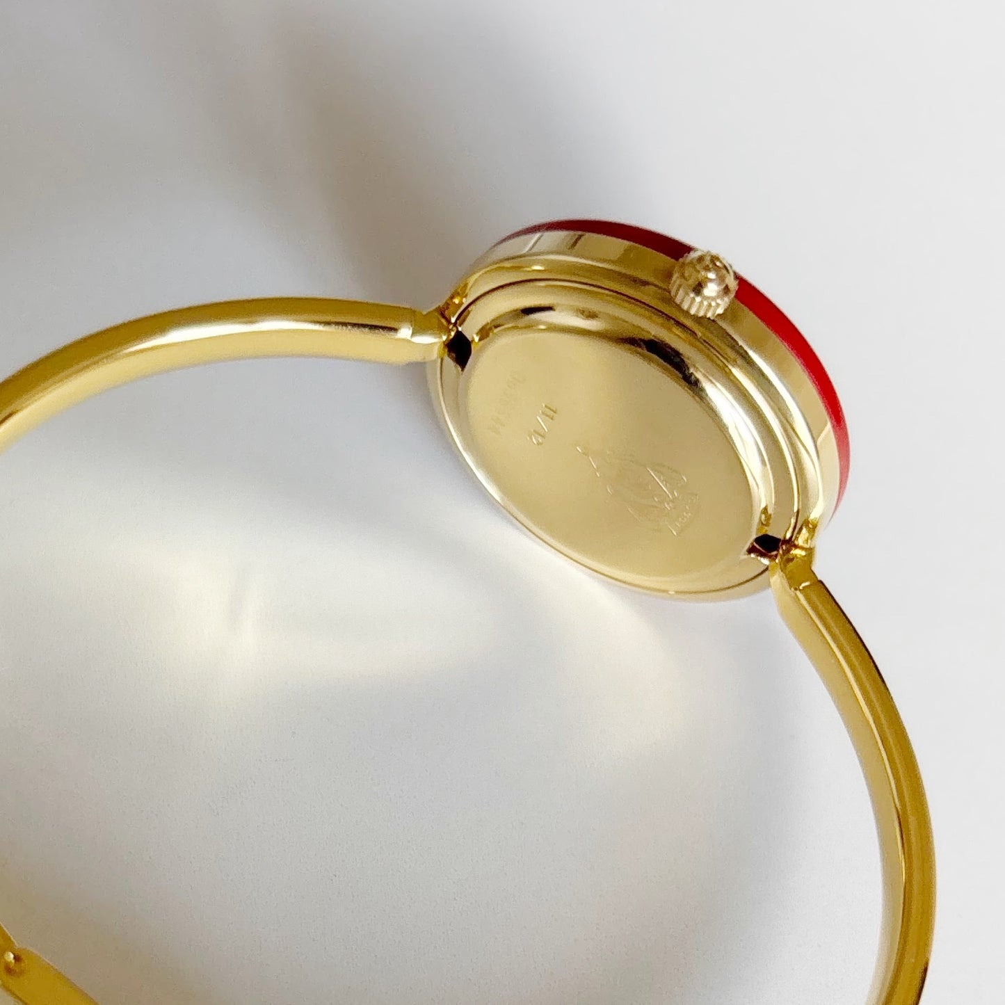 Gucci 1990s Interchangeable Bezel Gold Plated Bangle Watch with 12 bezels, case