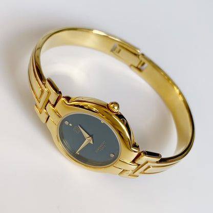 Givenchy 1990s Navy Dial Gold Plated Bangle Watch