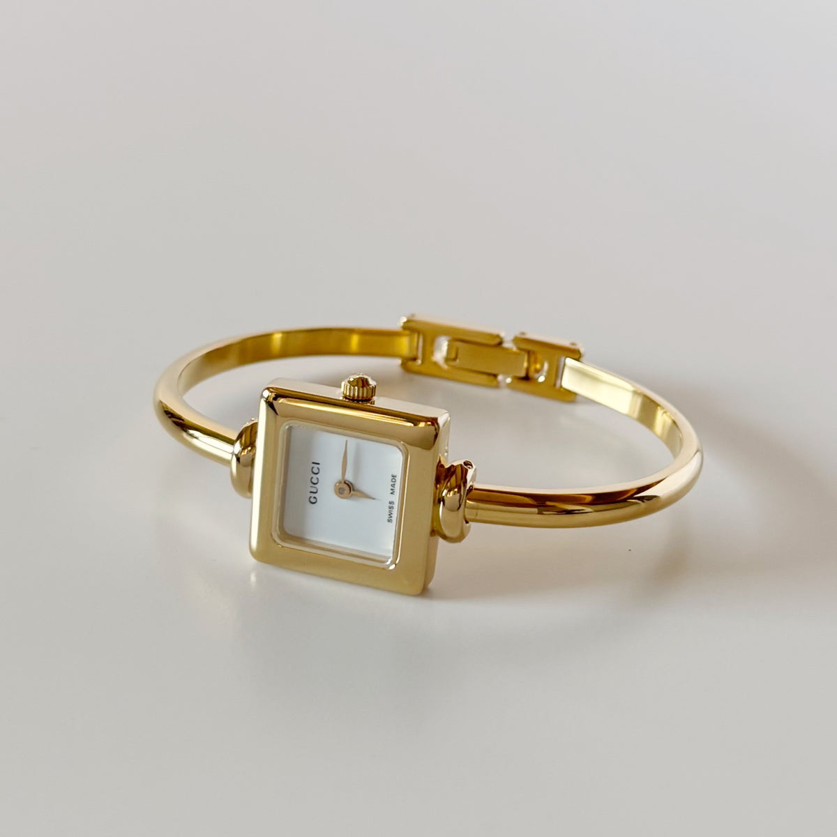 Gucci 1990s Square Dial Gold Plated Bangle Watch