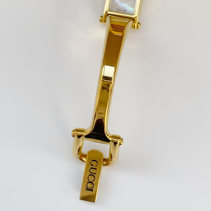 Gucci 1990s Rectangular Seashell Dial Gold Plated Bangle Watch