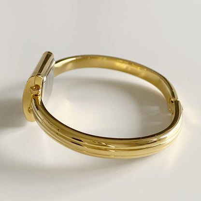 Yves Saint Laurent 1990s Gold Plated Bangle Watch