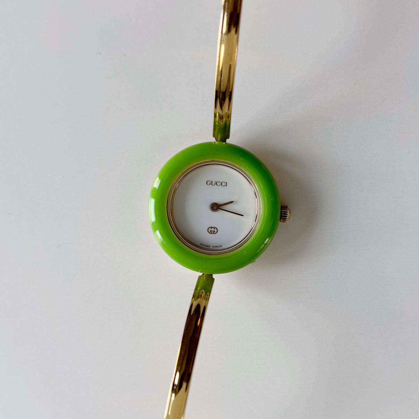 Gucci 1990s Interchangeable Bezel Gold Plated Bangle Watch with 12 bezels, case