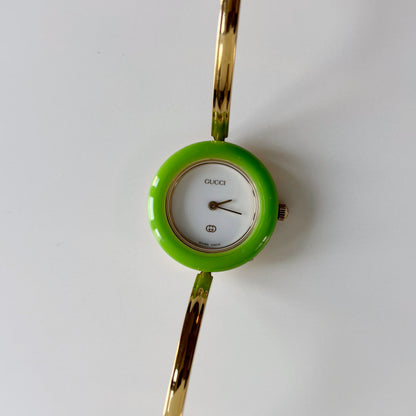 Gucci 1990s Interchangeable Bezel Gold Plated Bangle Watch with 12 bezels, case