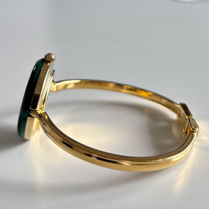 Gucci 1990s Interchangeable Bezel Gold Plated Bangle Watch with 12 bezels, case