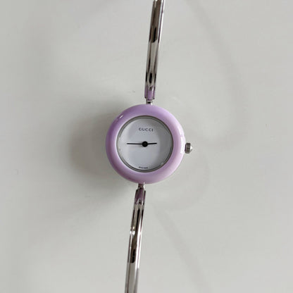 Gucci 1990s Interchangeable Bezel Stainless Steel Bangle Watch with 12 bezels, case