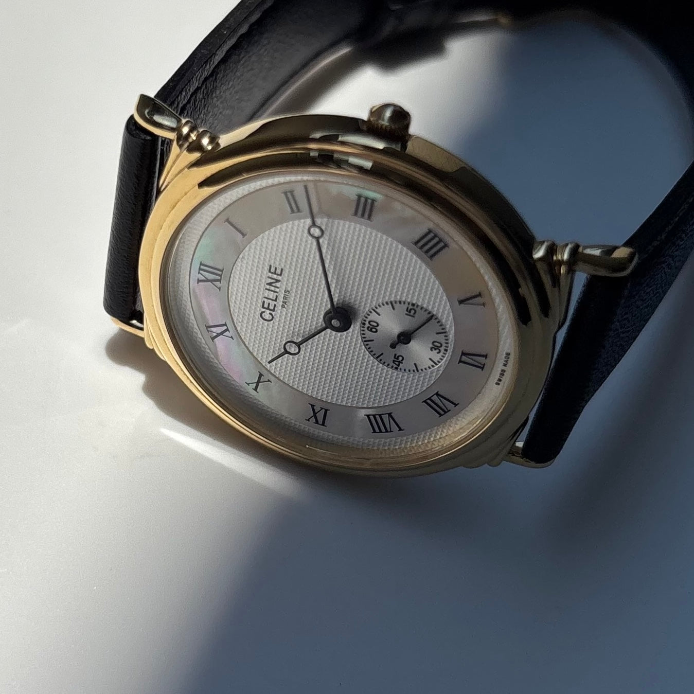 Celine 1990s Seashell Round Dial Gold Plated Watch (Large)