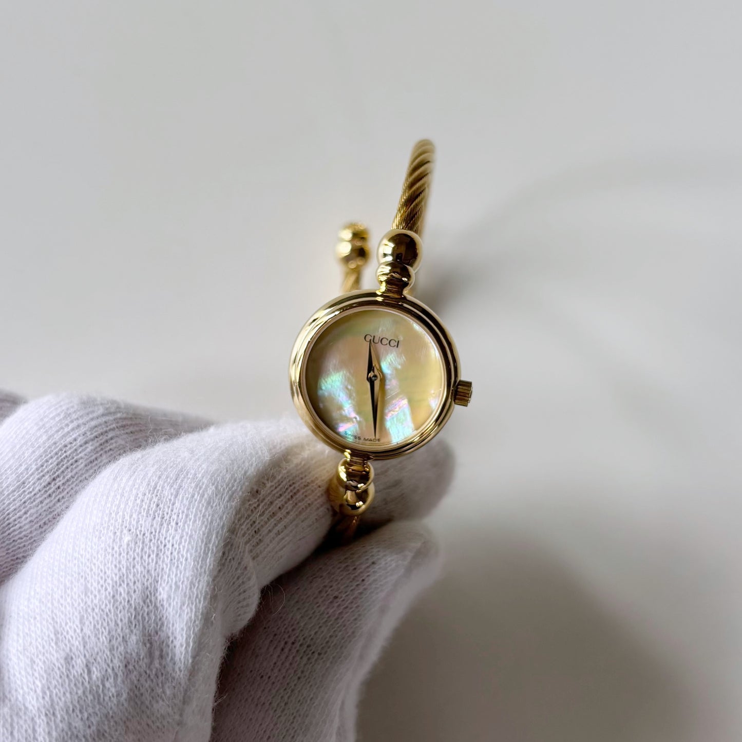 Gucci 1990s Seashell Dial Gold Plated Cable Band Bangle Watch
