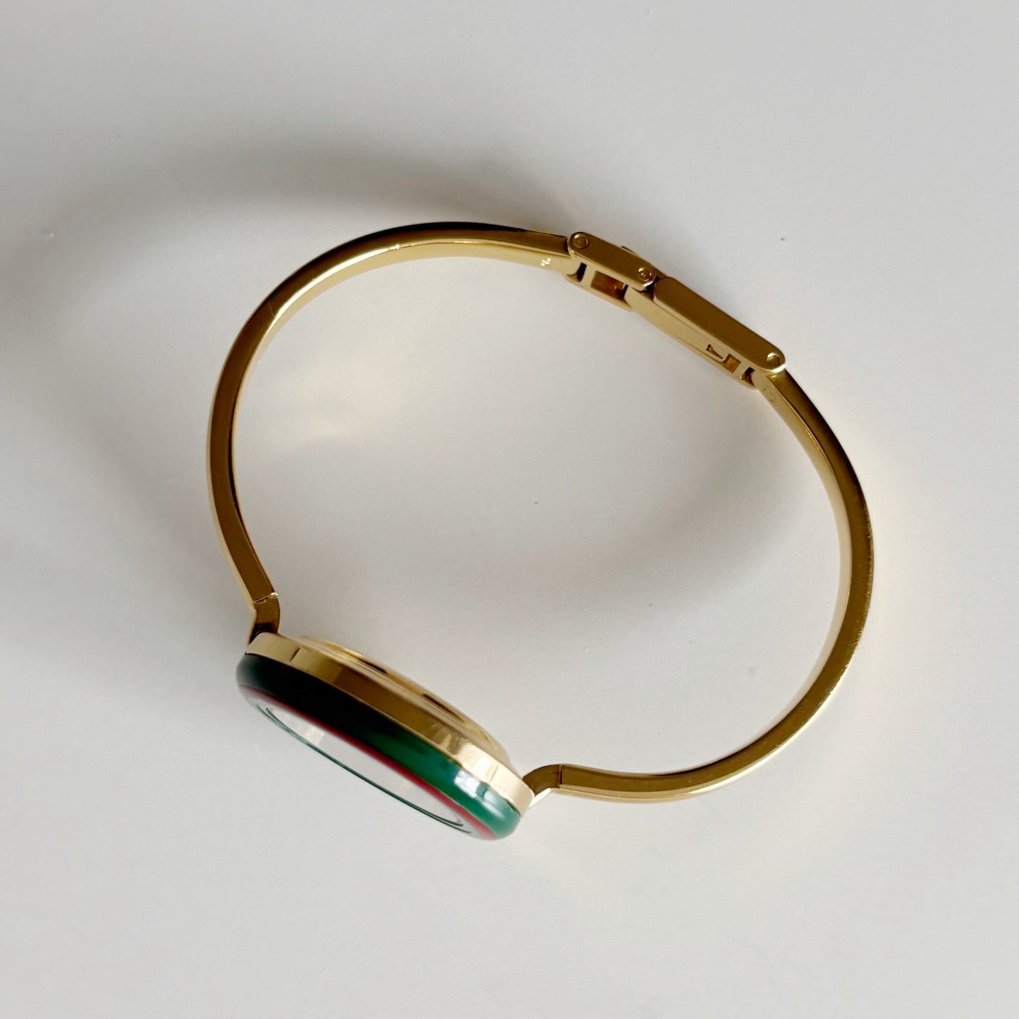 Gucci 1990s Interchangeable Bezel Gold Plated Bangle Watch with 12 bezels, case (Small)
