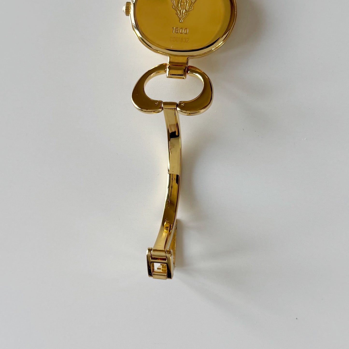Gucci 1990s Seashell Oval Dial Gold Plated Bangle Watch (Small)