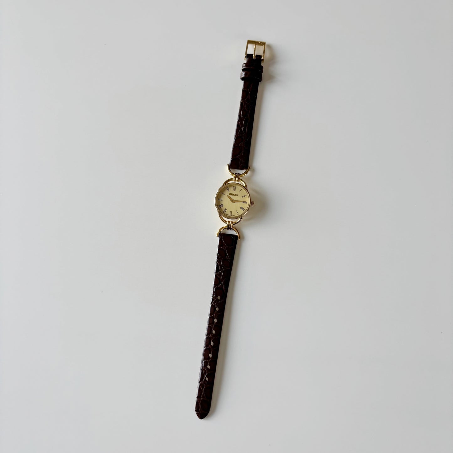 Gucci 1990s Gold Round Dial Horsebit Gold Plated Watch