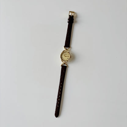 Gucci 1990s Gold Round Dial Horsebit Gold Plated Watch