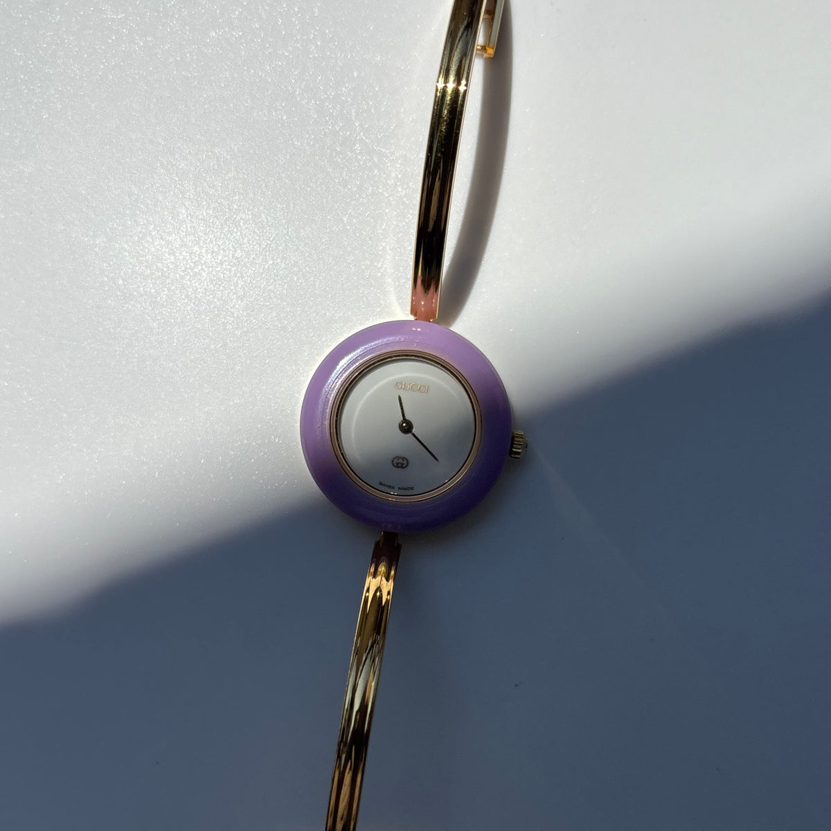 Gucci 1990s Interchangeable Bezel Gold Plated Bangle Watch with 12 bezels, case