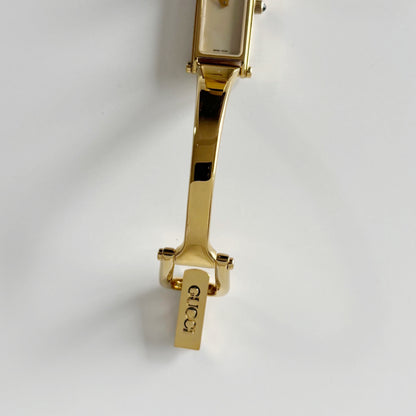 Gucci 1990s Rectangular Seashell Dial Gold Plated Bangle Watch