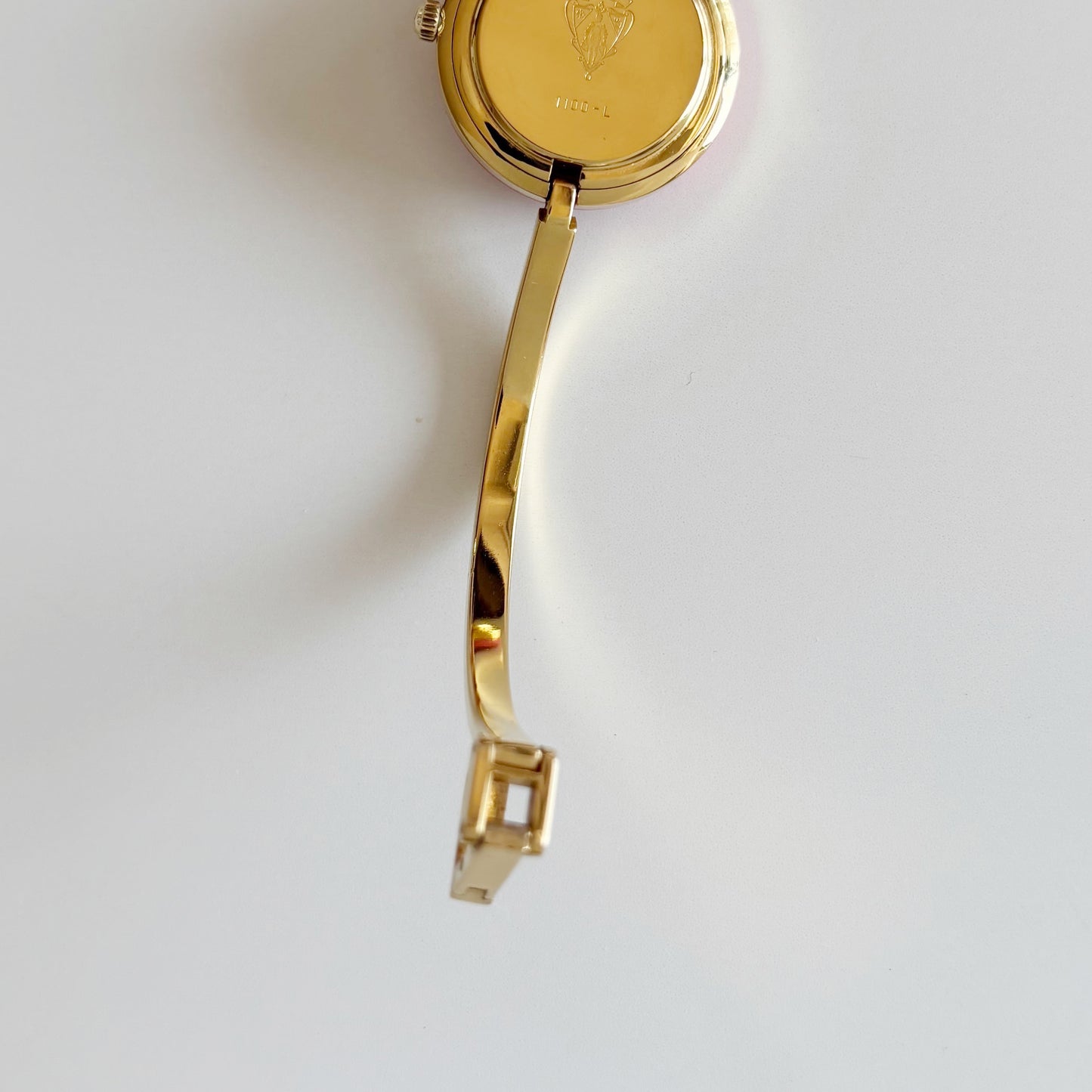 Gucci 1990s Interchangeable Bezel Gold Plated Bangle Watch with 12 bezels, case