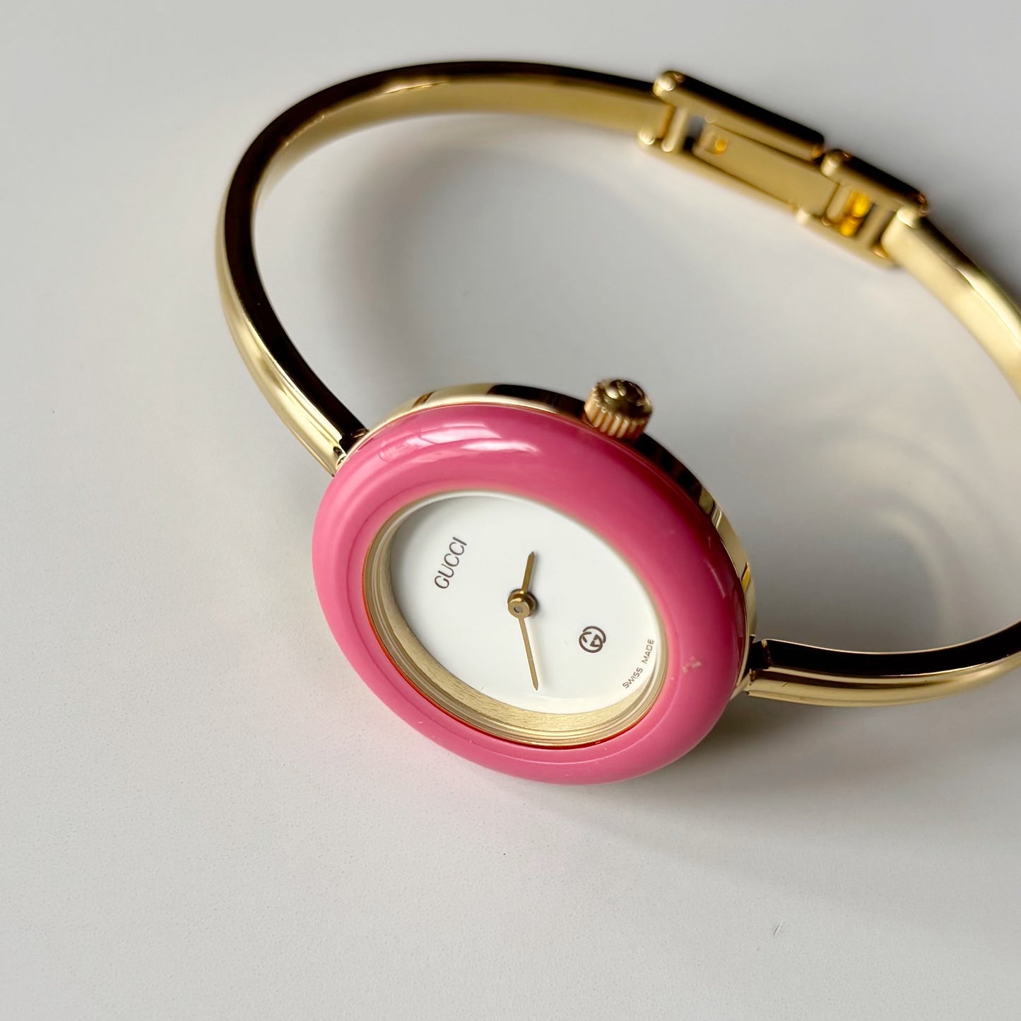 Gucci 1990s Interchangeable Bezel Gold Plated Bangle Watch with 12 bezels, case