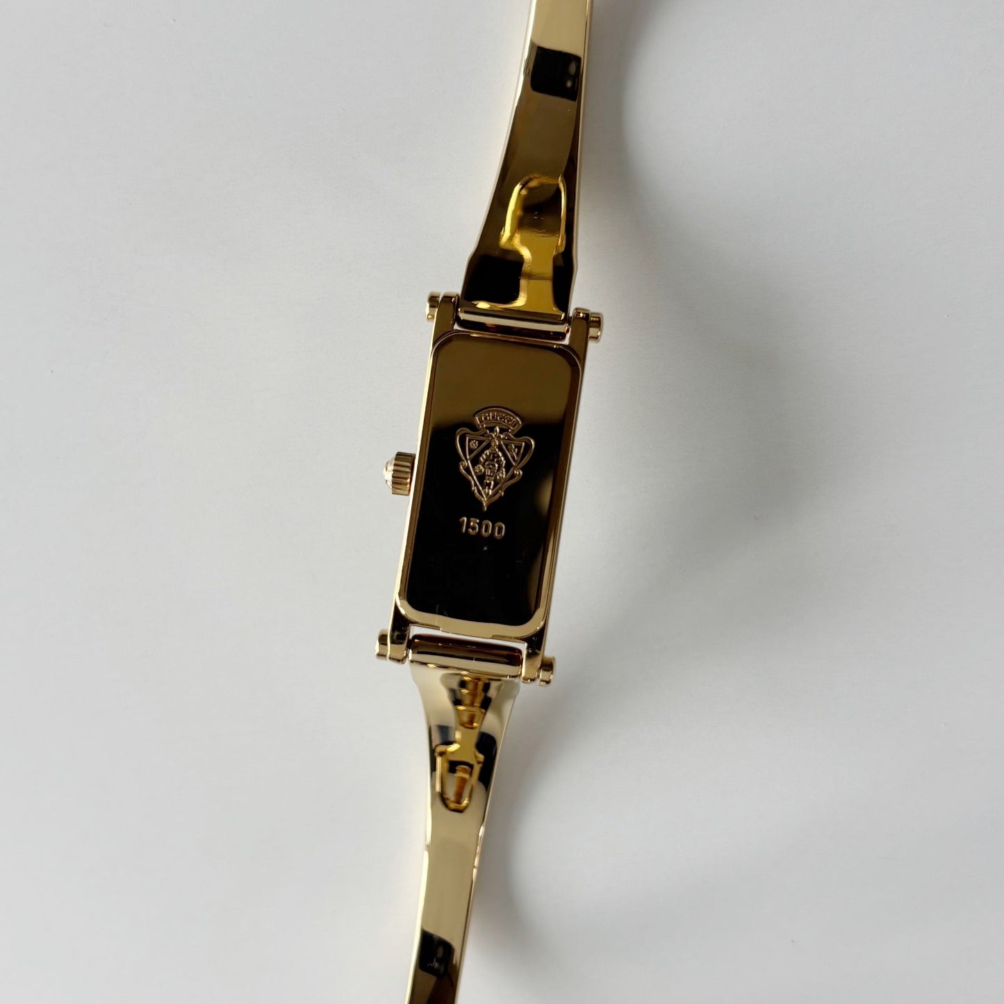 Gucci 1990s Gold Rectangular Dial Gold Plated Bangle Watch