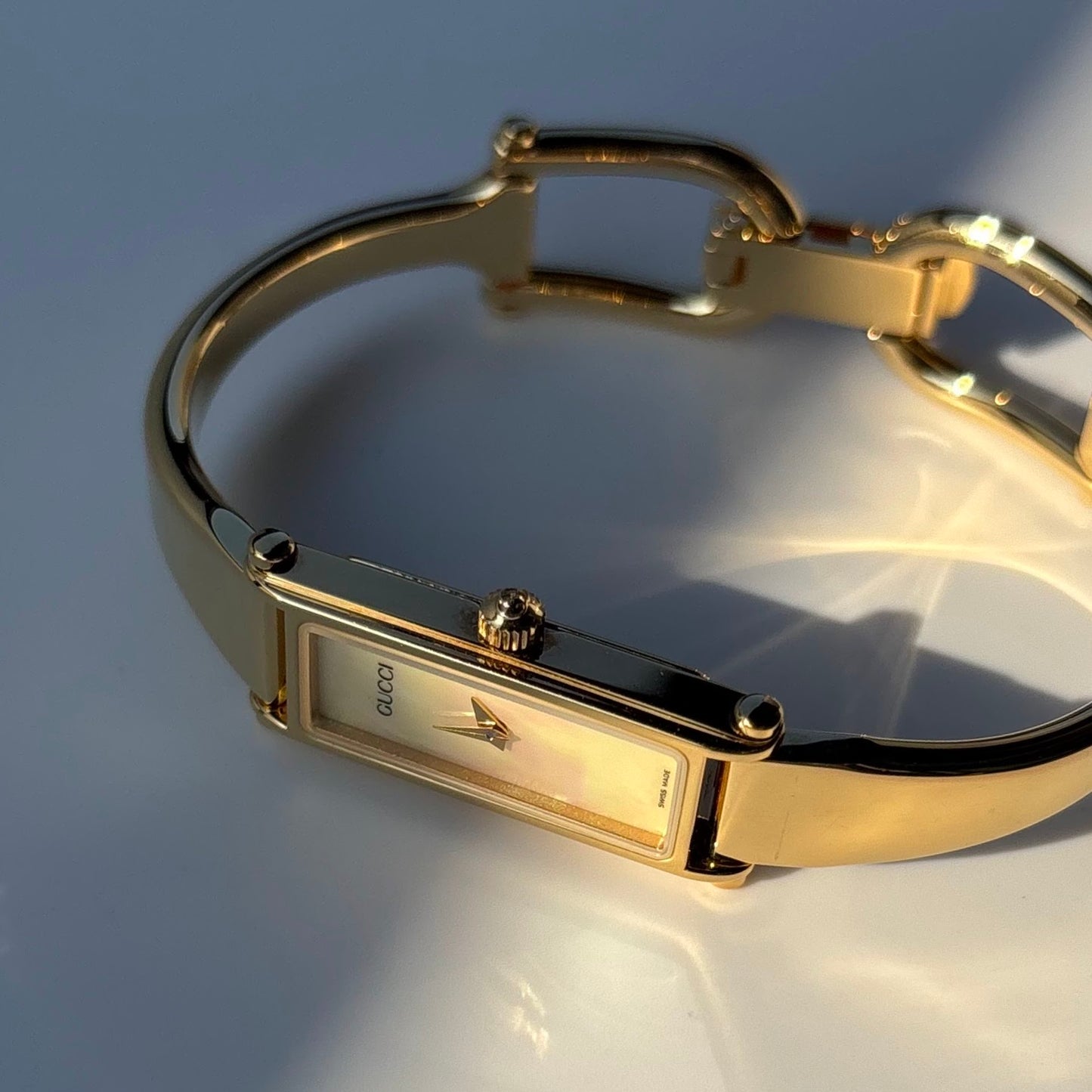 Gucci 1990s Seashell Rectangular Dial Gold Plated Bangle Watch