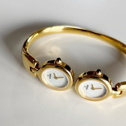 Fendi 1990s Seashell Dial Two Time Zone Gold Plated Bangle Watch