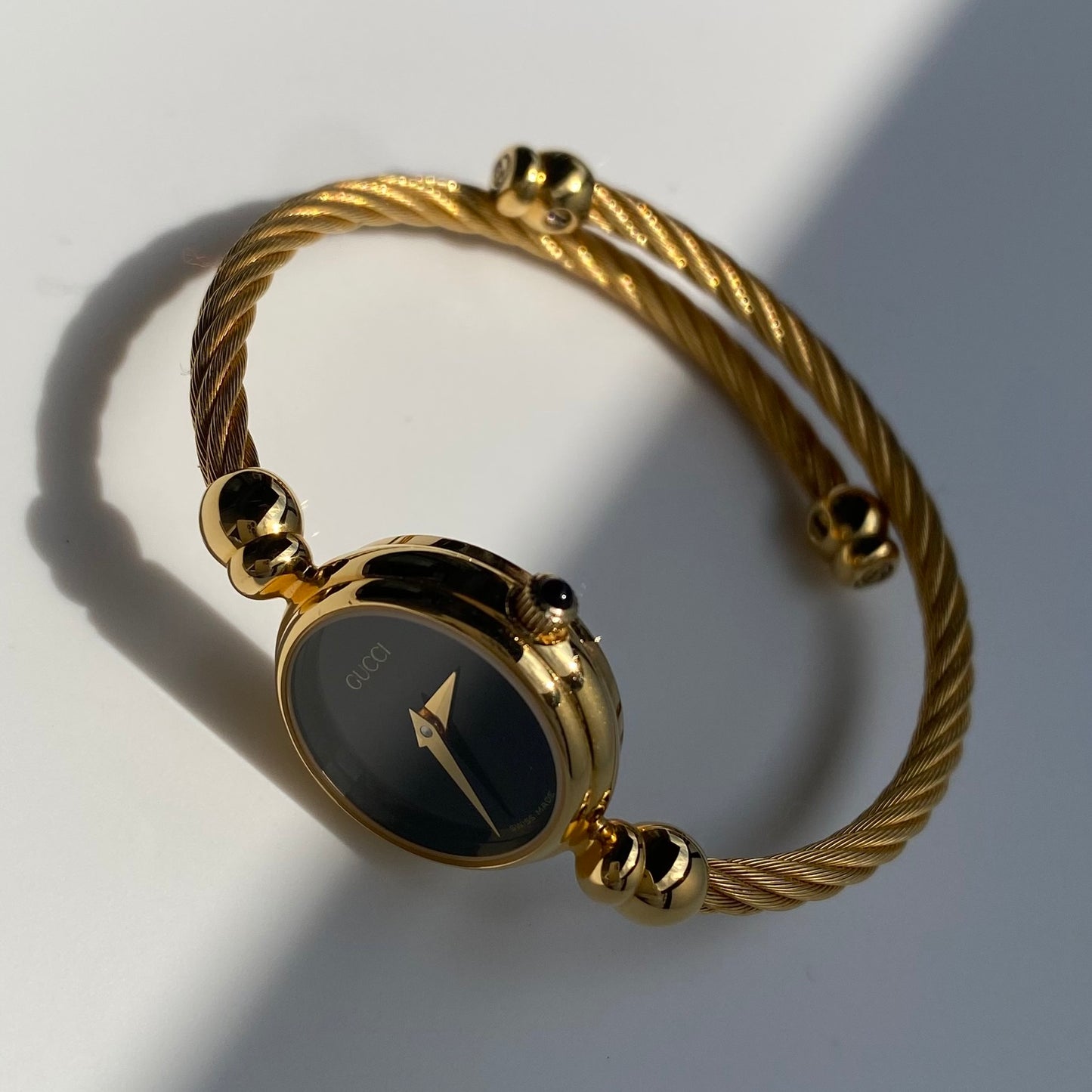 Gucci 1990s Black Dial Gold Plated Cable Bangle Watch