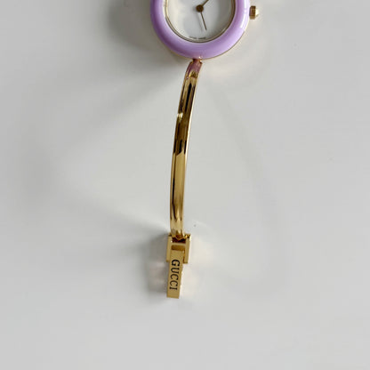 Gucci 1990s Interchangeable Bezel Gold Plated Bangle Watch with 12 bezels, case