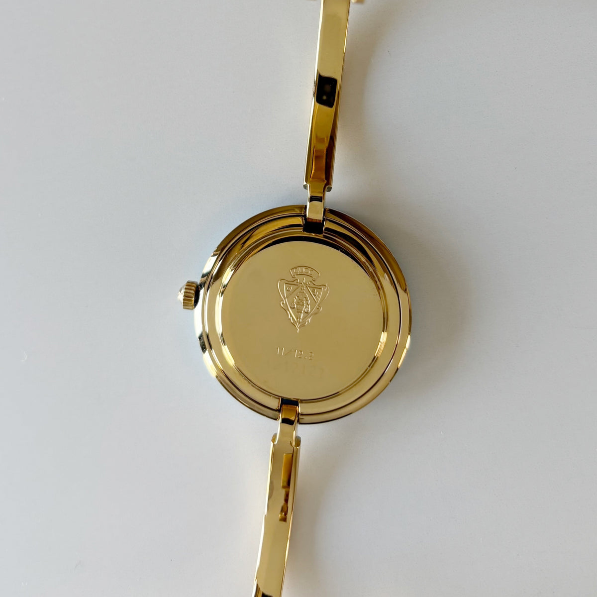 Gucci 1990s Interchangeable Bezel Gold Plated Bangle Watch with 12 bezels, case (Small)
