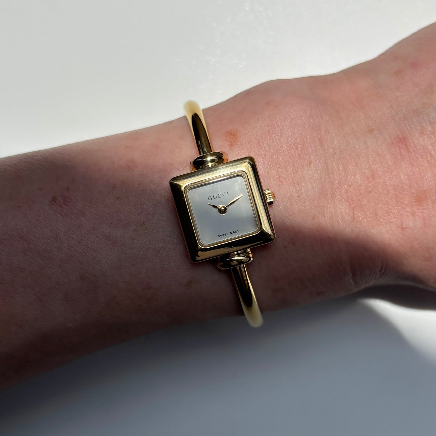 Gucci 1990s Square Dial Gold Plated Bangle Watch