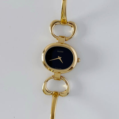 Gucci 1990s Black Dial Gold Plated Bangle Watch