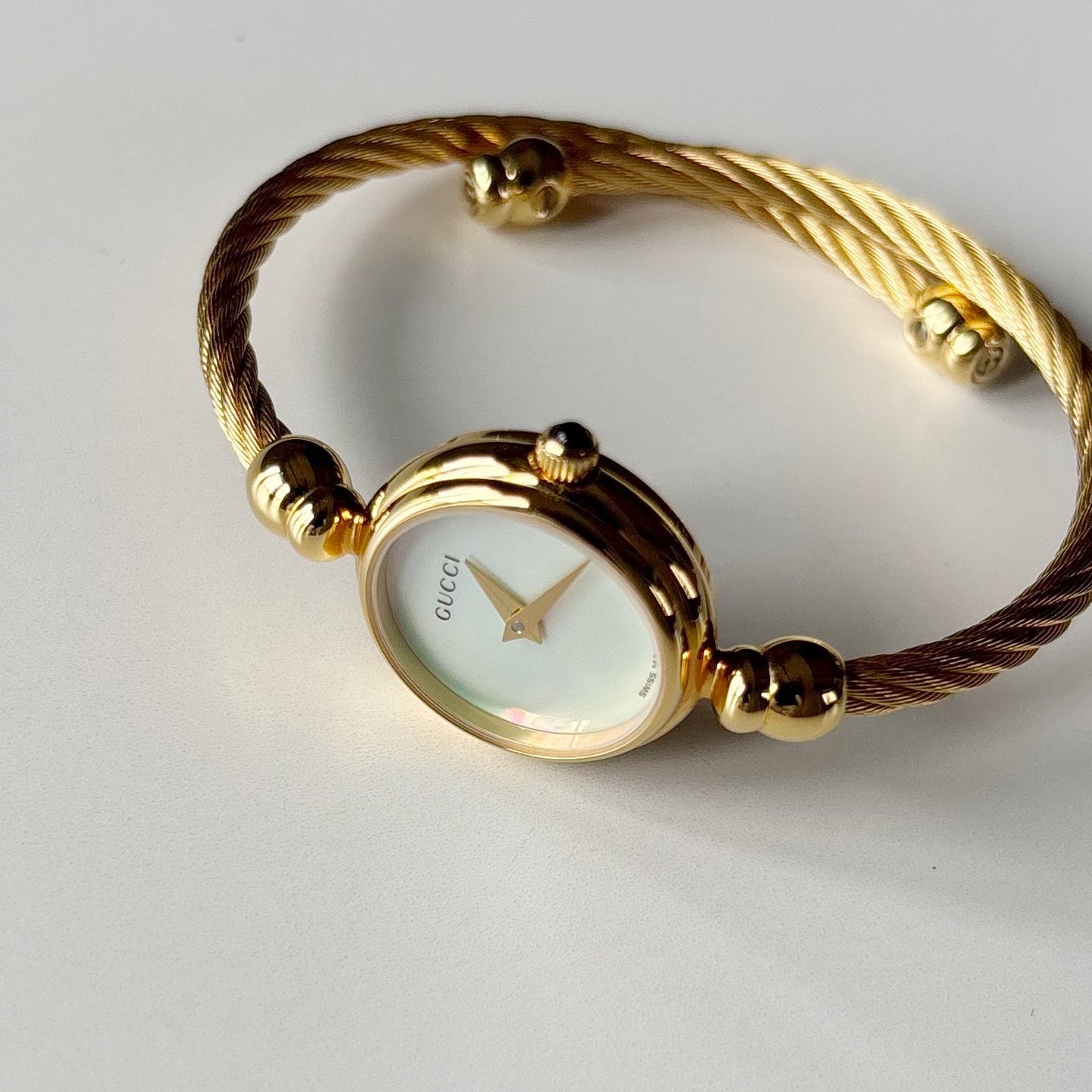 Gucci 1990s Seashell Dial Gold Plated Cable Bangle Watch