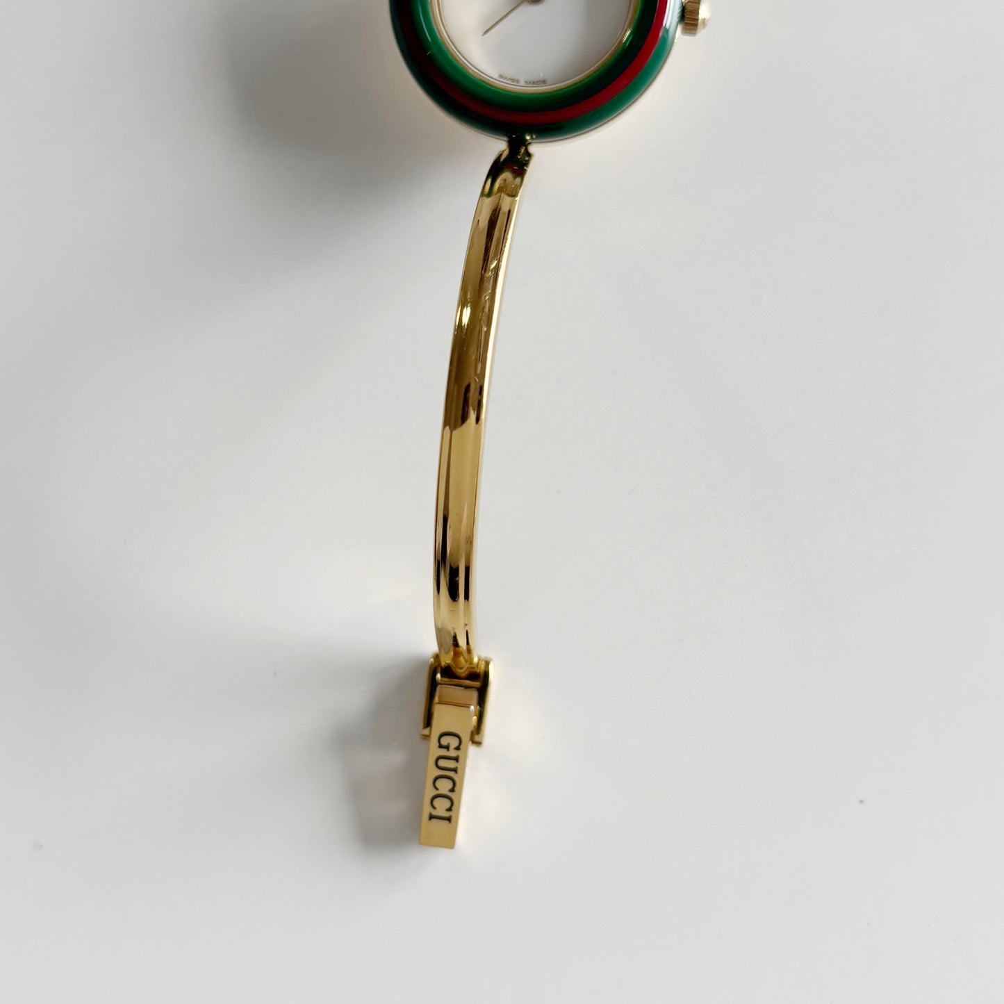 Gucci 1990s Interchangeable Bezel Gold Plated Bangle Watch with 12 bezels, case