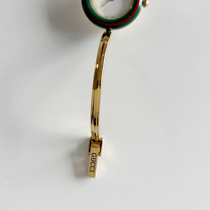 Gucci 1990s Interchangeable Bezel Gold Plated Bangle Watch with 12 bezels, case