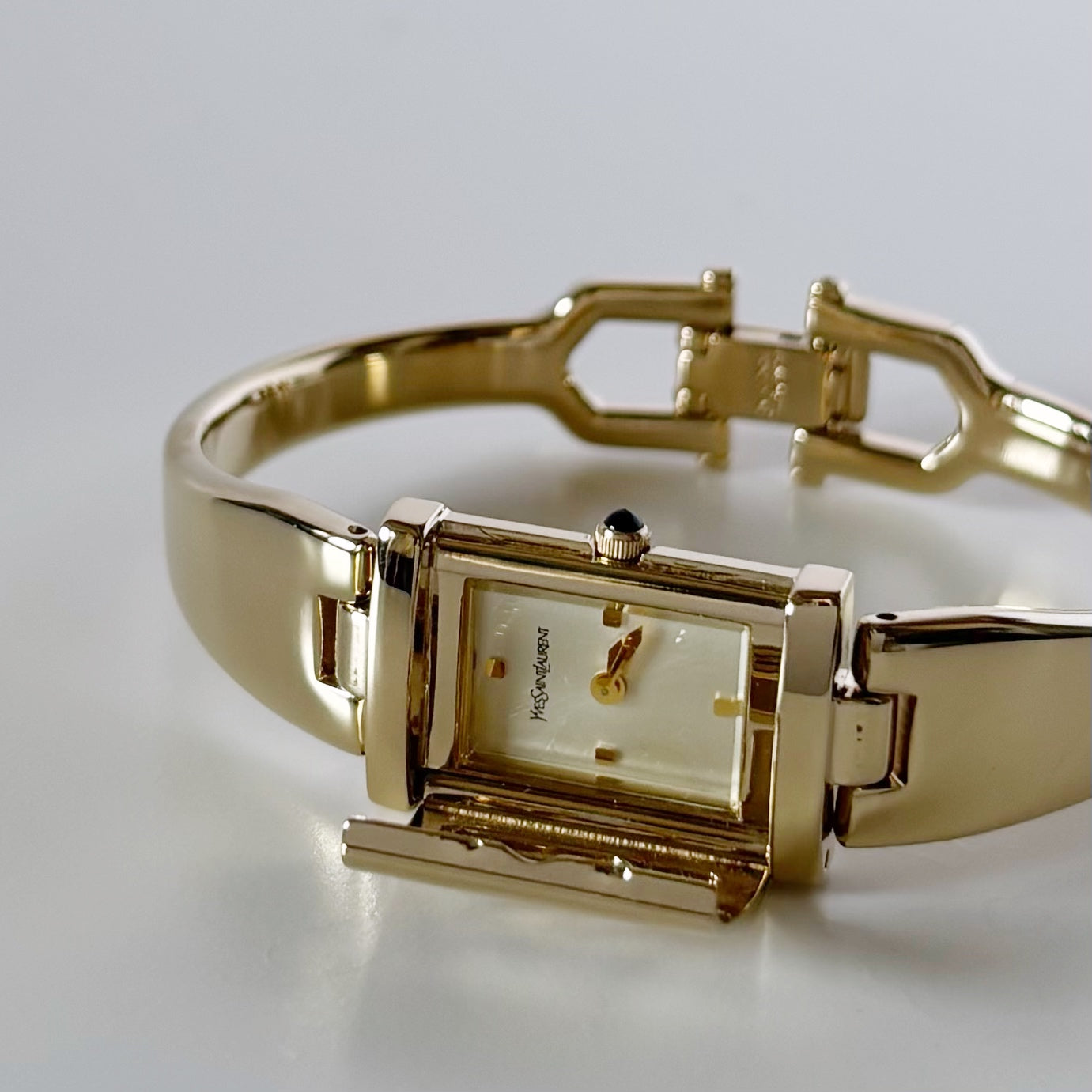 Yves Saint Laurent 1990s Peek-A-Boo Gold Plated Bangle Watch