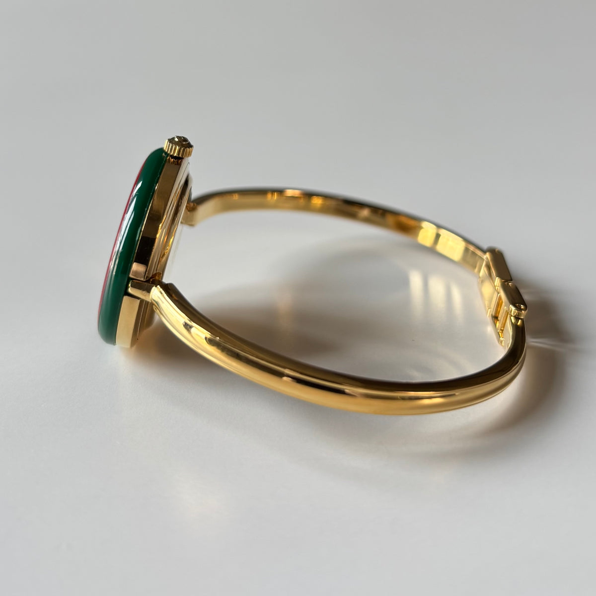 Gucci 1990s Interchangeable Bezel Gold Plated Bangle Watch with 12 bezels, case