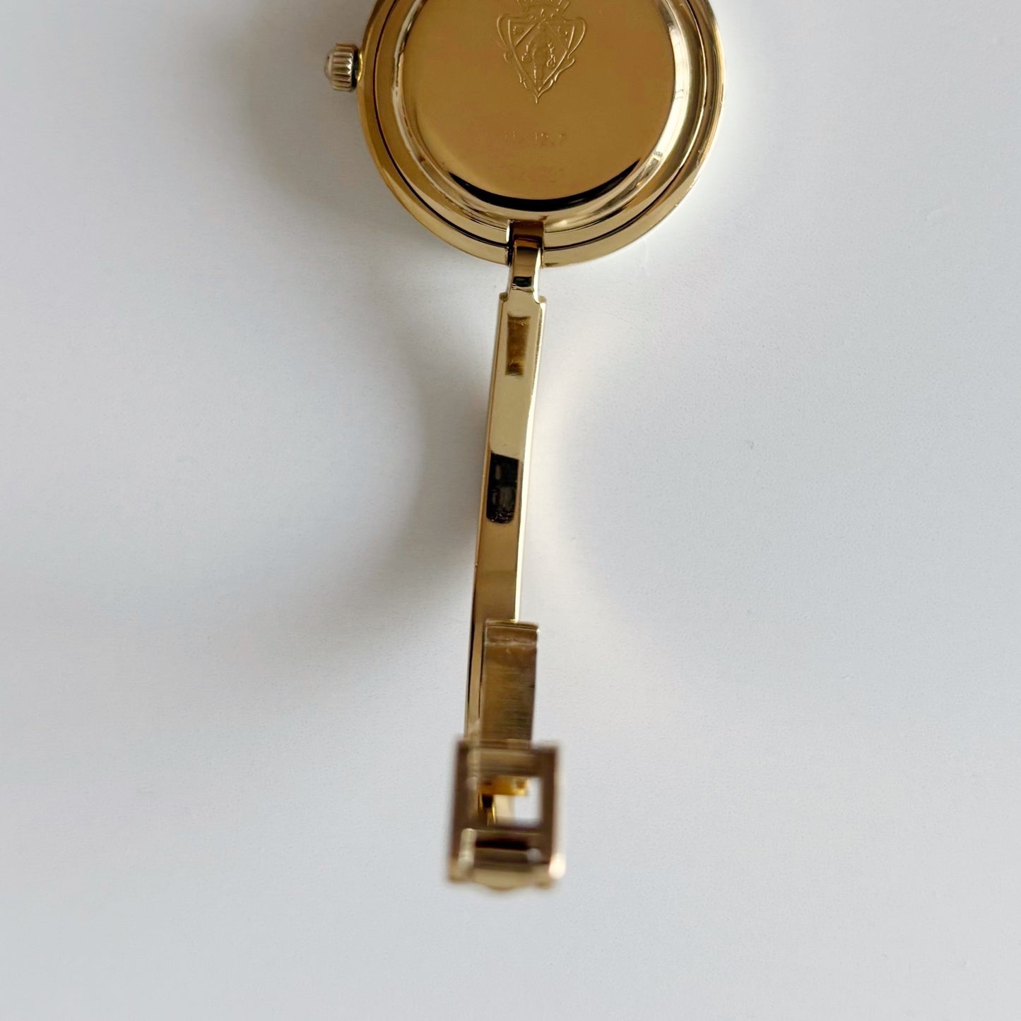 Gucci 1990s Interchangeable Bezel Gold Plated Bangle Watch with 12 bezels, case
