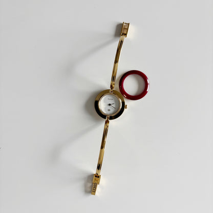 Gucci 1990s Interchangeable Bezel Gold Plated Bangle Watch with 12 bezels, case