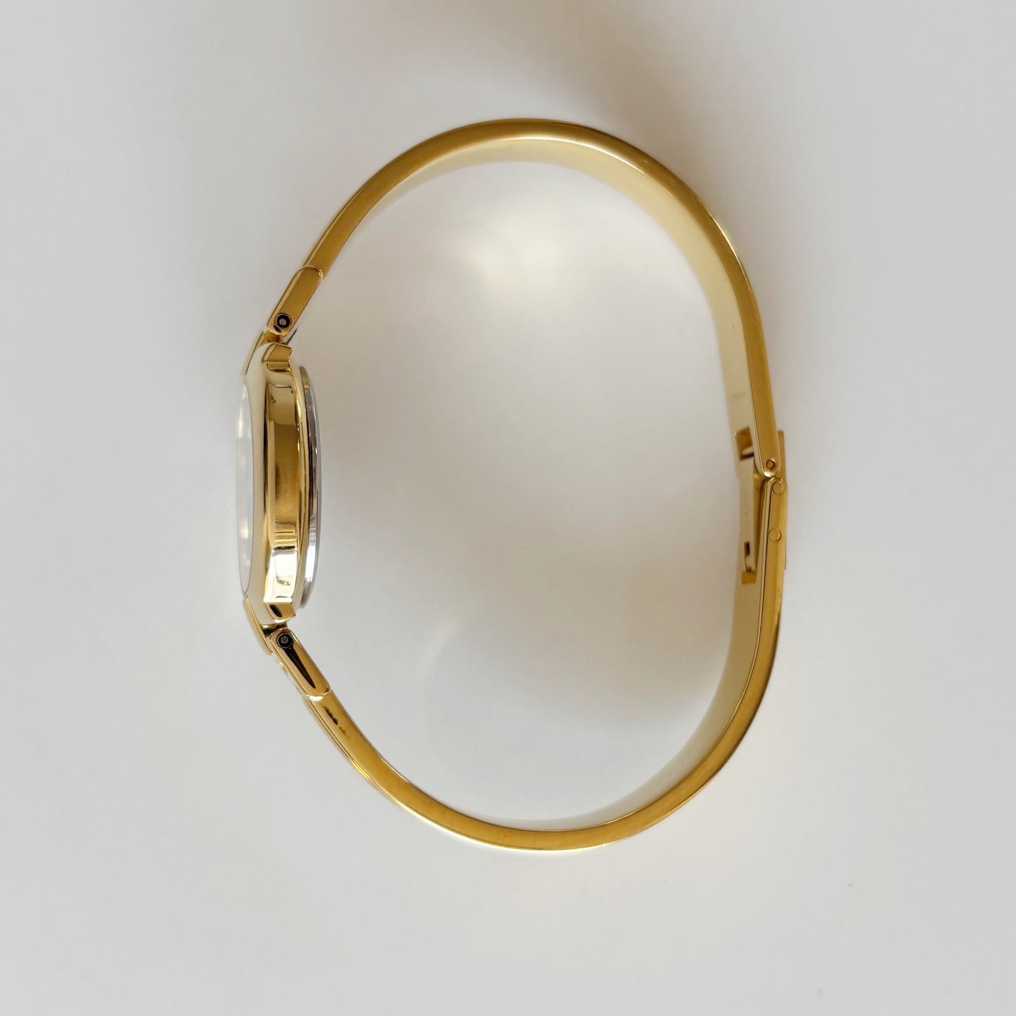 Givenchy 1990s Navy Round Dial Gold Plated Bangle Watch