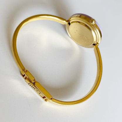 Gucci 1990s Interchangeable Bezel Gold Plated Bangle Watch with 12 bezels, case