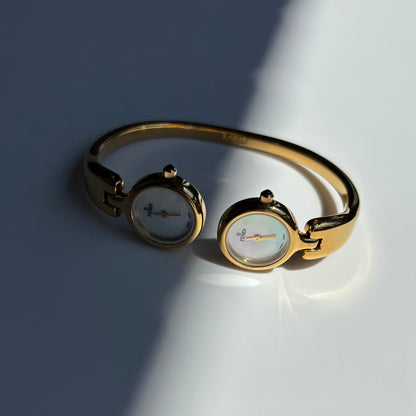 Fendi 1990s Seashell Dial Two Time Zone Gold Plated Bangle Watch