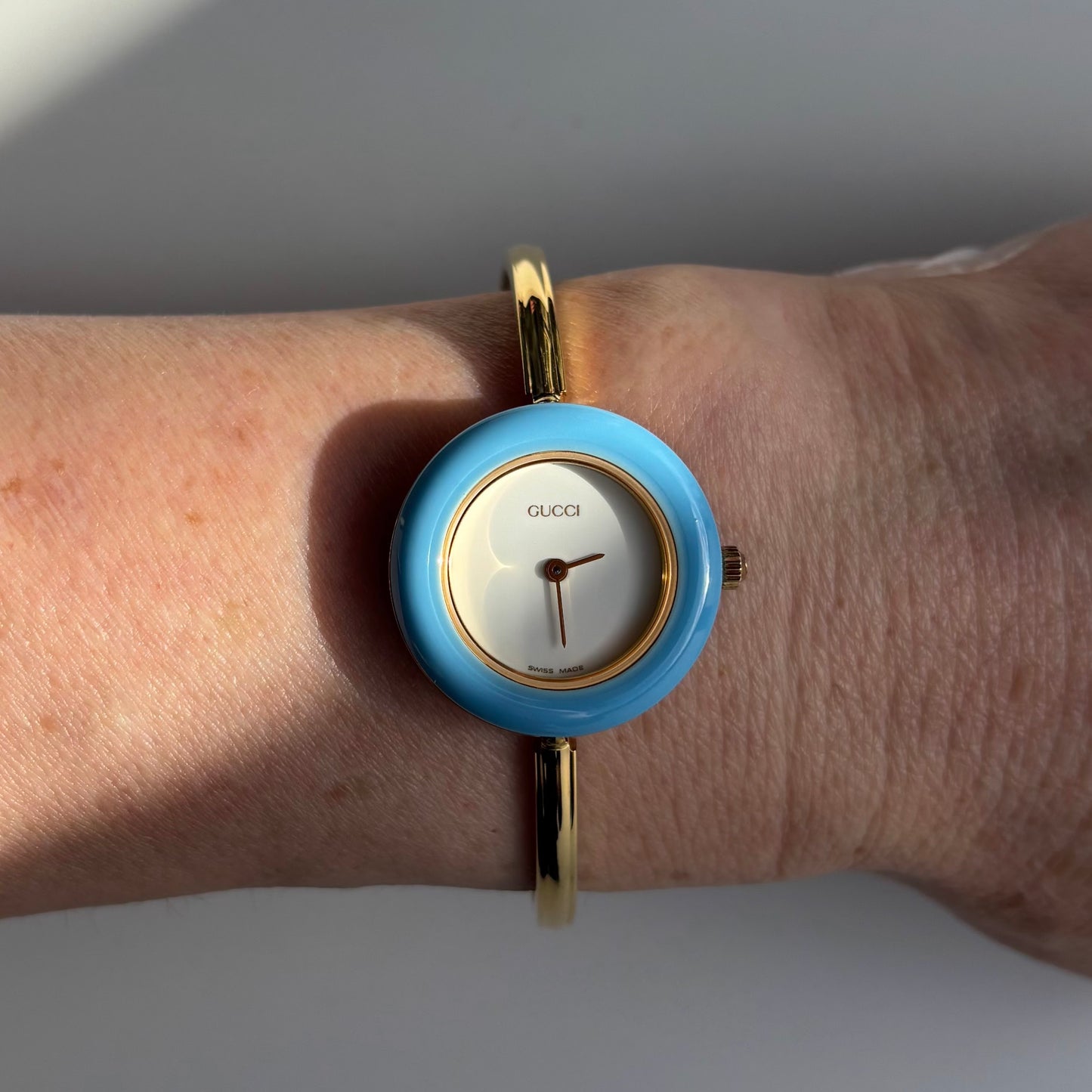 Gucci 1990s Interchangeable Bezel Gold Plated Bangle Watch with 12 bezels, case