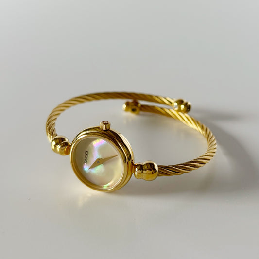Gucci 1990s Seashell Dial Gold Plated Cable Bangle Watch