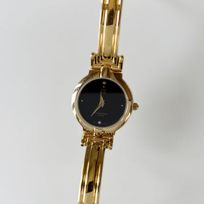 Givenchy 1990s Black Round Dial Gold Plated Bangle Watch