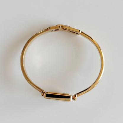 Gucci 1990s Seashell Square Dial Gold Plated Bangle Watch