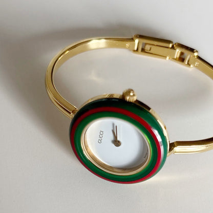 Gucci 1990s Interchangeable Bezel Gold Plated Bangle Watch with 12 bezels, case (Small)