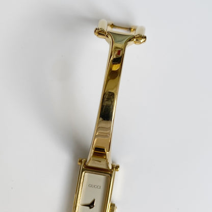 Gucci 1990s Rectangular White Dial Gold Plated Bangle Watch