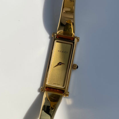 Gucci 1990s Gold Dial Gold Plated Bangle Watch (Small)