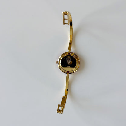 Gucci 1990s Interchangeable Bezel Gold Plated Bangle Watch with 12 bezels, case