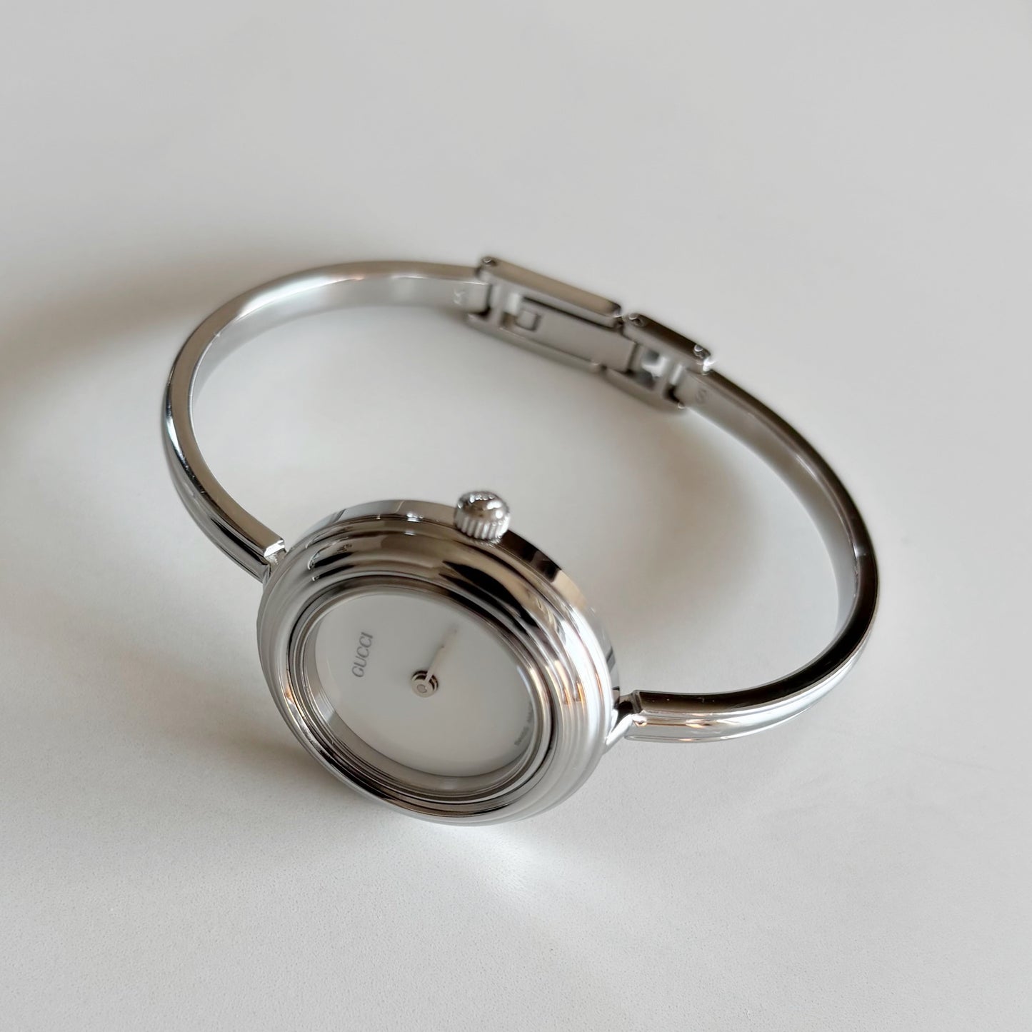 Gucci 1990s Interchangeable Bezel Stainless steel Bangle Watch with 12 bezels, case (Small)