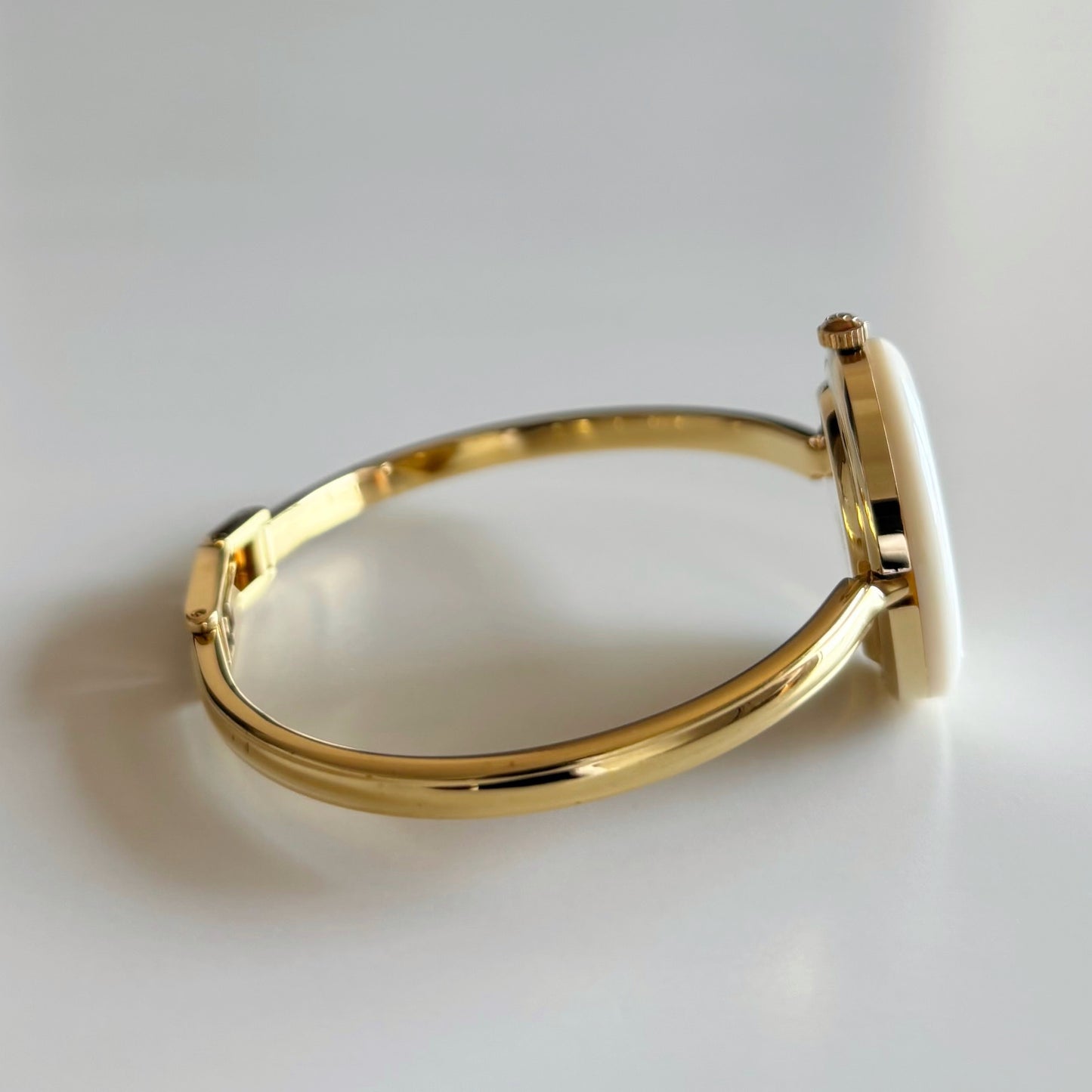 Gucci 1990s Interchangeable Bezel Gold Plated Bangle Watch with 12 bezels, case