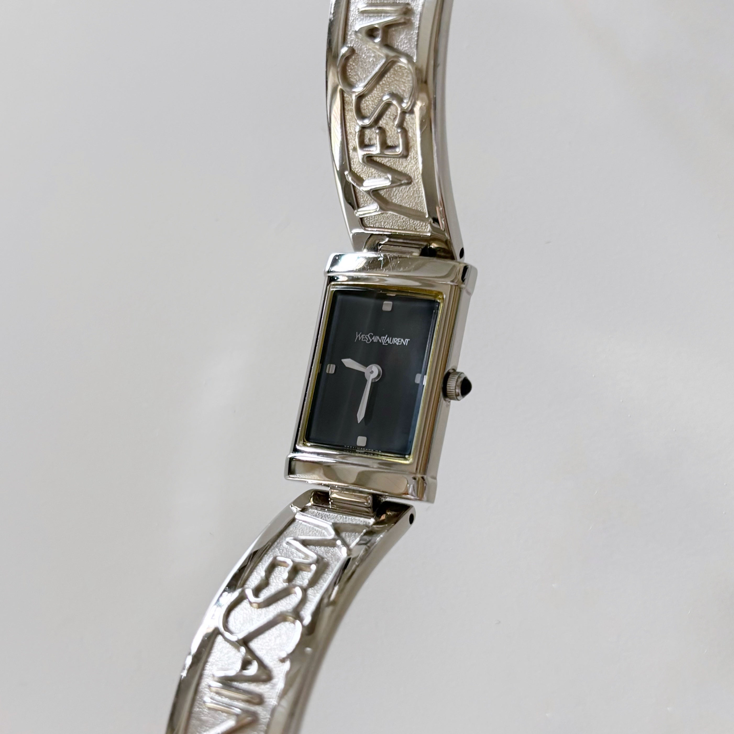 Yves Saint Laurent 1990s Black Dial Silver Bangle Watch