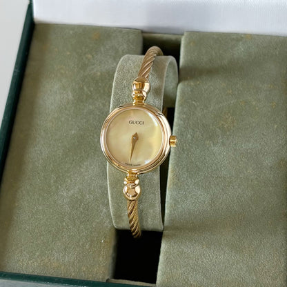 Gucci 1990s Seashell Dial Gold Plated Cable Band Bangle Watch